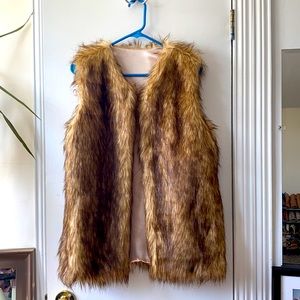 Faux fur vest.